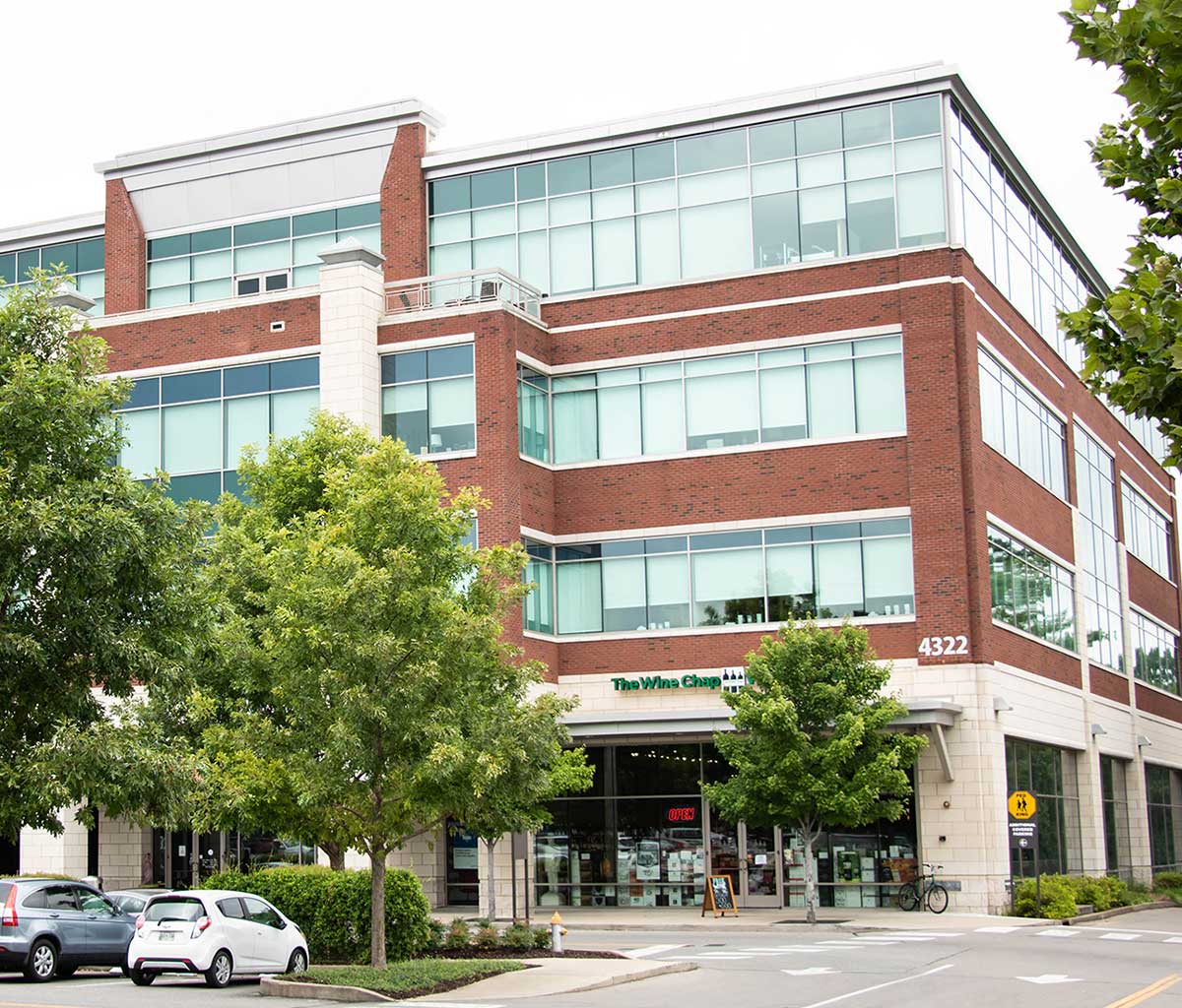 A building with many windows on the outside of it